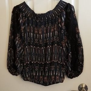 Patterned off the shoulder shirt with lace on arms